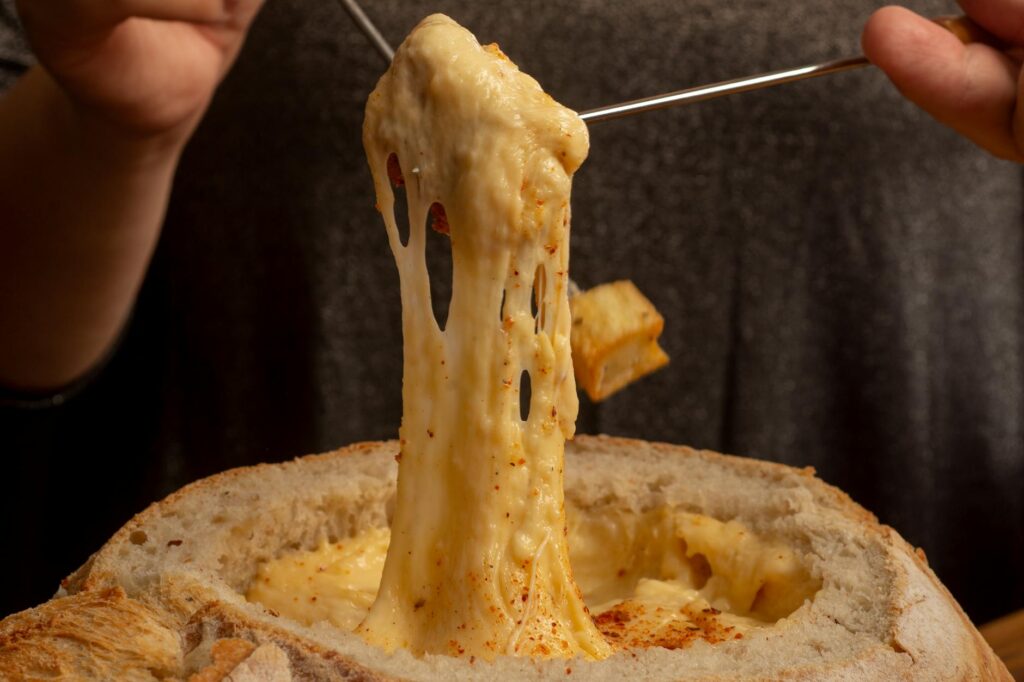 Combien de fromage prévoir par — pot de fondue fromage et pain